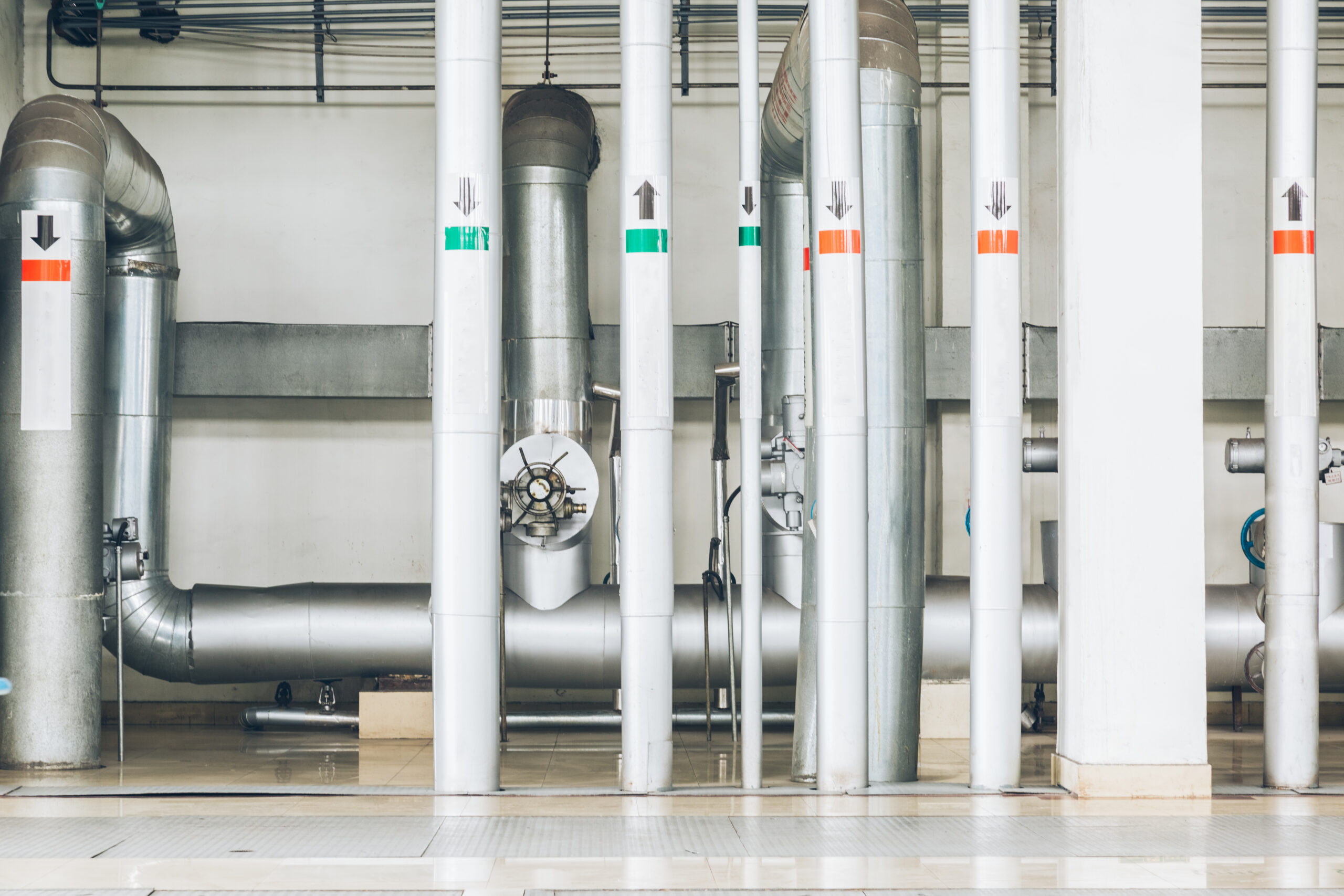 steel pipelines and cables in a plant